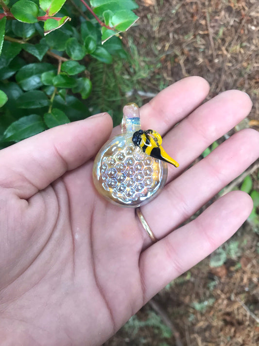 Honeycomb pendant with bee